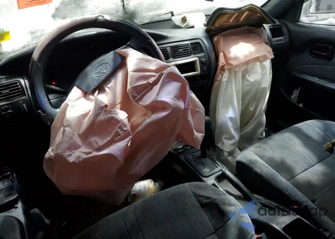 1996 Toyota Corolla Dx z USA, uszkodzony, nr VIN 2T1BB02E9TC160657